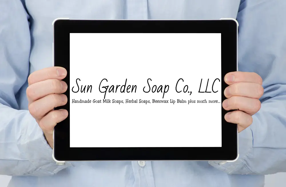 Sun Garden Soap Company Llc Logo Displayed on a Tablet
