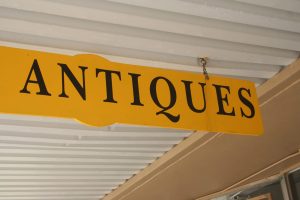 Yellow Antique Store Sign
