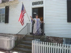 Docent Waving from the Mary Washington House