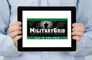 Military Grid square logo displayed on a tablet, design by Simply Web Services