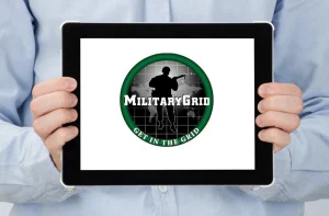 Military Grid round logo displayed on a tablet, design by Simply Web Services